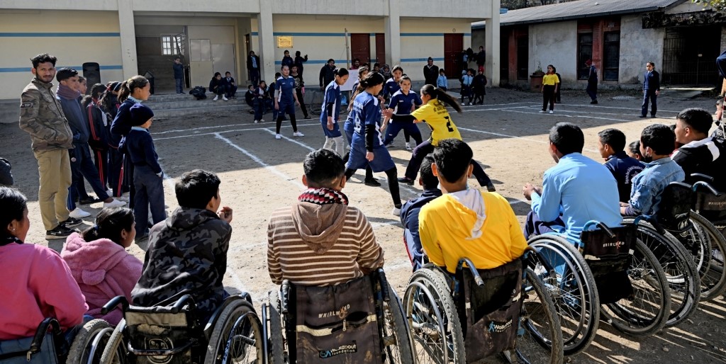 Children in Khagendra Nawajiwan Kendra Secondary School in Nepal participate in sports day program