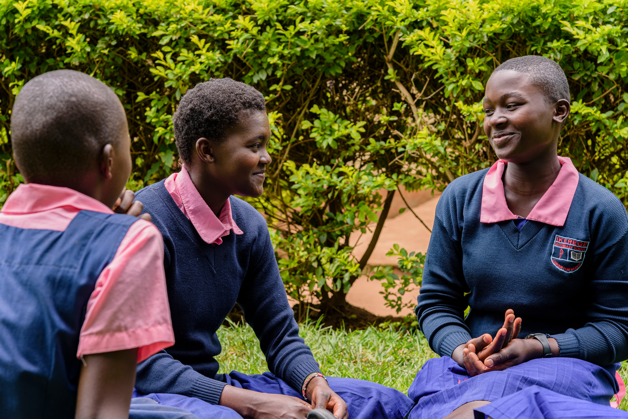 girls in school uniform smiling