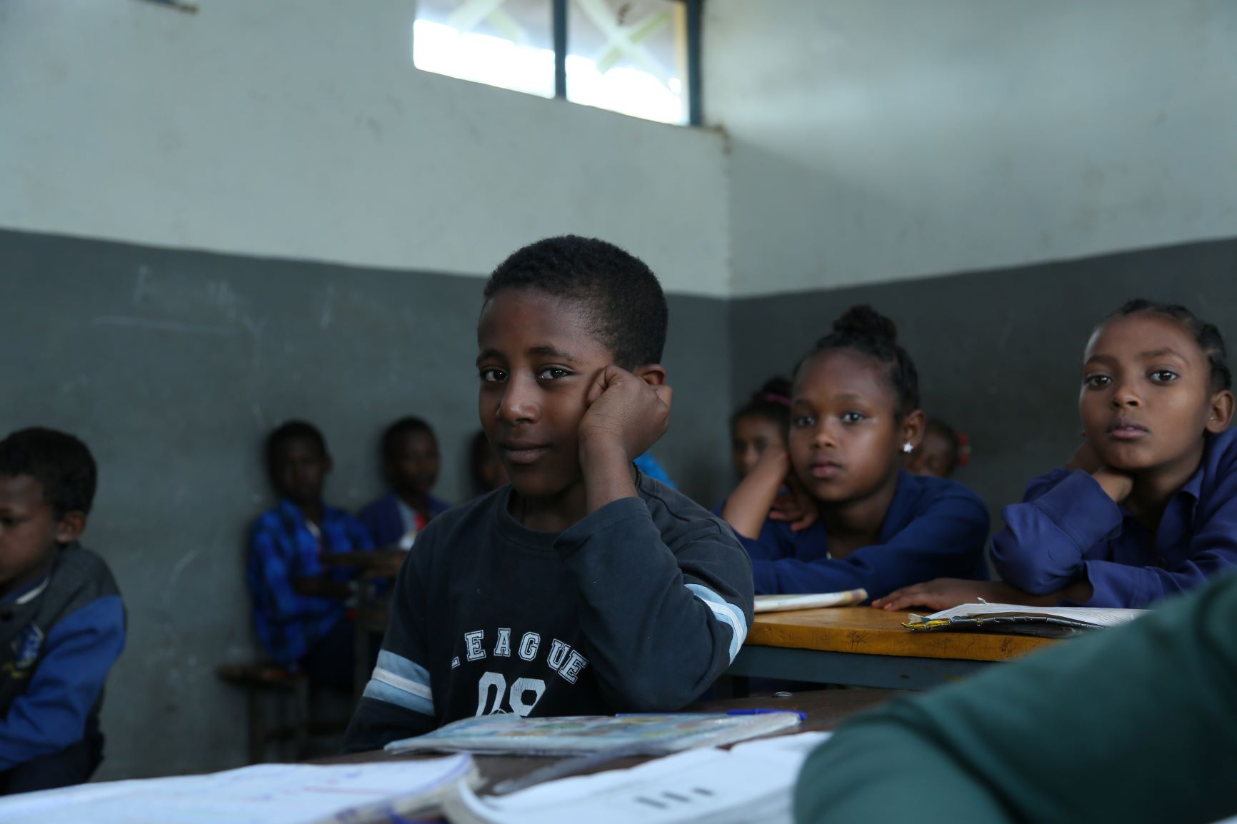 photo of a kid in a classrom